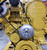A front engine trimout kit installed on a Caterpillar C15 or 3406E engine to run dual v-belts