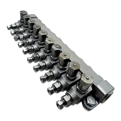 Assembled CL-32 grease metering valve manifold shown for illustration purposes. Kits include the required components to assemble the manifold during installation and are not supplied preassembled.