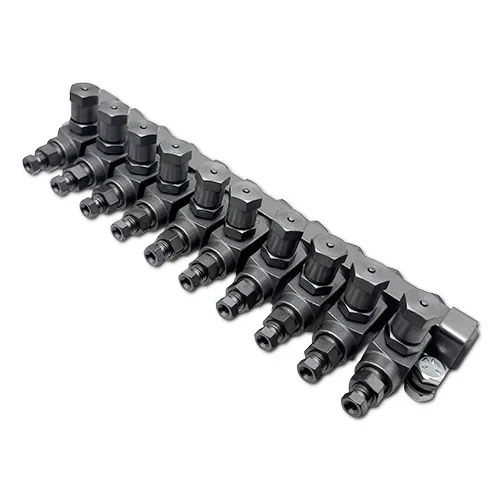 Assembled CM-33 grease metering valve manifold shown for illustration purposes. Kits include the required components to assemble the manifold during installation and are not supplied preassembled.