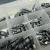 Heavy Equipment Automatic Lubrication Parts Kit with metric M10x1 fittings, tubing, hose studs, adapters, and repair components organized in a portable parts box.