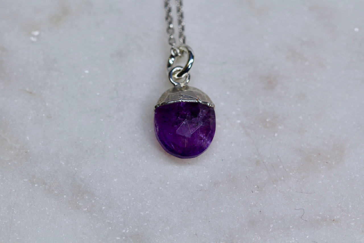 Amethyst gemstone pendant on a sterling silver necklace