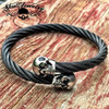 9" Black Steel Cable Bracelet with Double Skulls and White Gem Stone Eyes