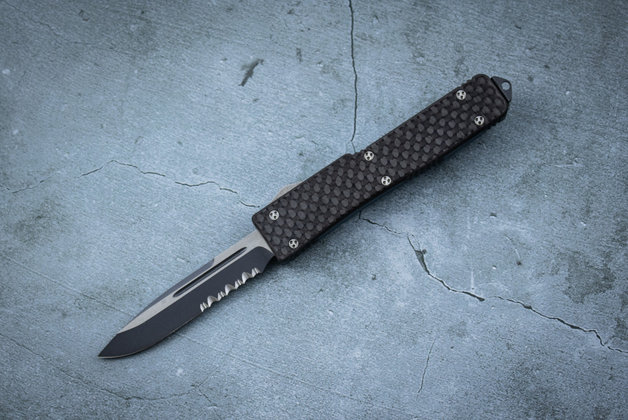 Microtech Knives UTX-70 #1906 08/2004 S/E OTF Automatic Knife Partially Serrated 2-Tone Black Blade w/ Carbon Fiber / Blue Aluminum Handle