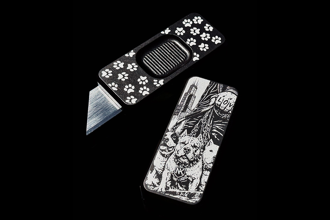 Nomikos Knives x Rivery MFG Collab Woof Woof Zero Utility Knife USA Made Smooth Operator Pattern Black Aluminum Handle w/ Lanyard Hole