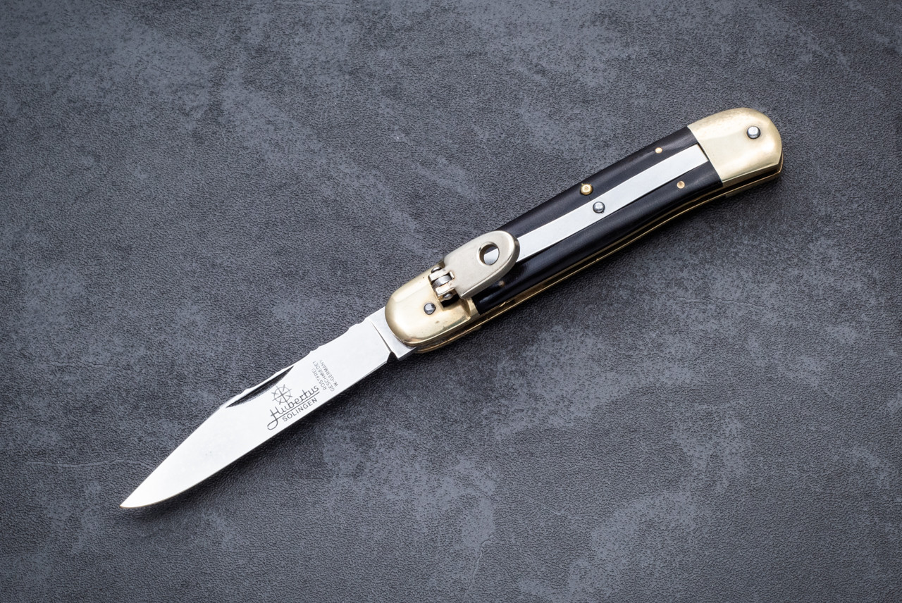 Hubertus "HUBECTUS" W Germany Stamp knives Lever Lock Automatic Knife Clip Point Blade w/ File Work and Black Micarta Handles 