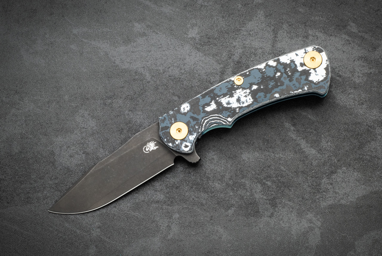 Rick Hinderer Knives Project X Clip Point MagnaCut Battle Black Blade w/ Light Stonewash Blue Frame Lock and White Storm FatCarbon Fiber Handle