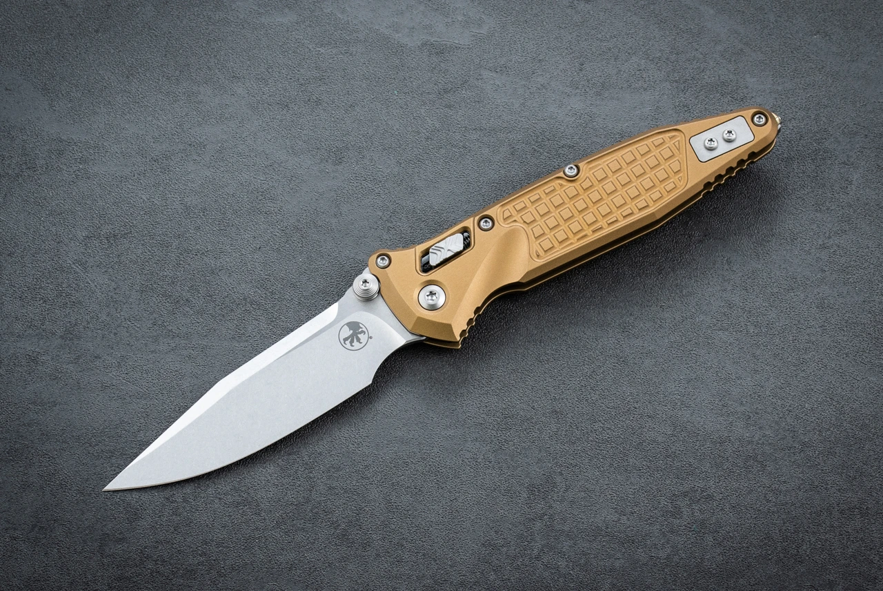 Microtech Knives Socom RAM-LOK S/E Manual Knife Clip Point Stonewash Blade w/ Tan Frag Aluminum Handles - 160RL-10FRTA