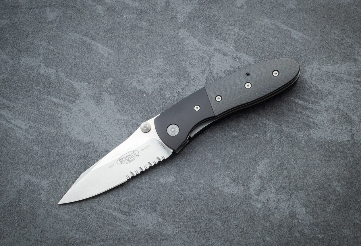 Microtech Knives Lightfoot LCC Dual Action Automatic Knife Stonewashed Blade Partially Serrated w/ Titanium Bolsters and Carbon Fiber Handles - 09/2001
