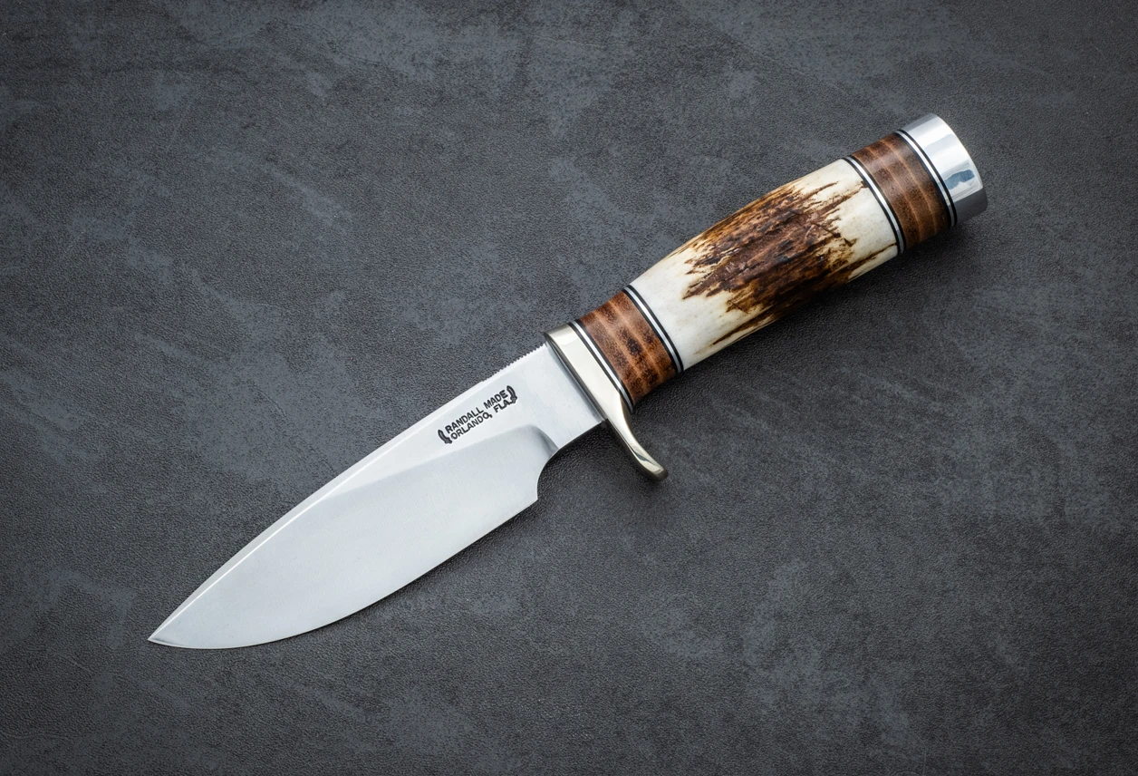 Randall Made Knives Model 25-5 Trapper Fixed Blade knife Carbon Steel Polished Blade w/ Stag Horn Handle and Leather Sheath