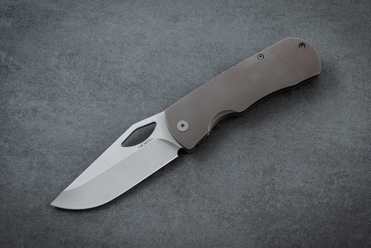 McNees Custom Knives Little Dixon Frame Lock Magnacut Stonewash Drop Point Blade w/ Bronze Atomic Smooth Titanium Handles and Stonewash Hardware