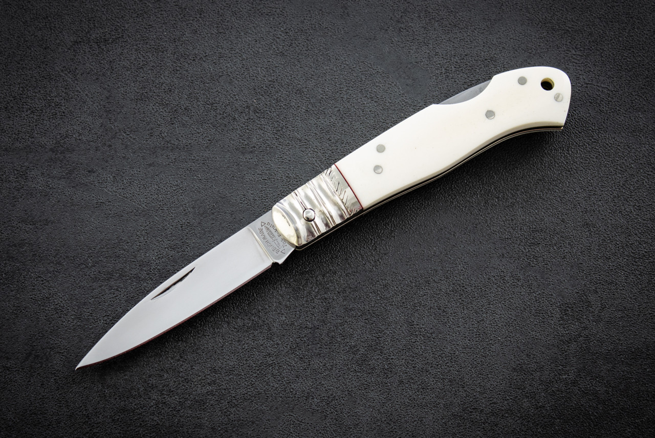 Takao Fukuta Benchmade Lock Back Knife Polished Blade w/ White