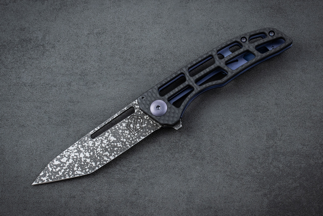 John Gray Knives Slitter V2 Dark Rain Magnacut Blade w/ Skeletonized Blue Titanium Frame Lock and Skeletonized Carbon Fiber Handle 