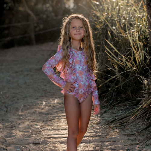Elevate your little one's summer style with our stunning girls' swimwear collection. From vibrant prints to elegant designs, we've got the perfect swimsuits for every water adventure.