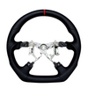 Toyota FJ Cruiser interior with an upgraded aftermarket steering wheel in carbon fiber.