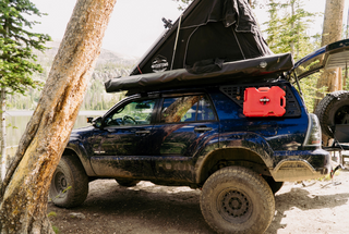 4th gen 4Runner overlanding by mountain lake in Utah