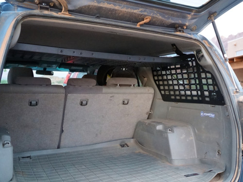 Dual rear interior MOLLE panels and storage shelf installed in a 4th Gen 4Runner.
