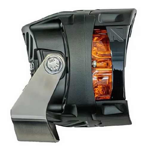 Side view of the NACHO Quatro SAE light emitting a powerful fog beam in low-visibility conditions.