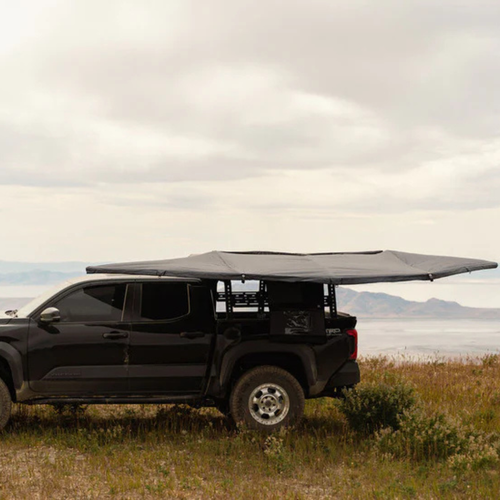5th gen Toyota 4Runner with roof rack awning extended for shade