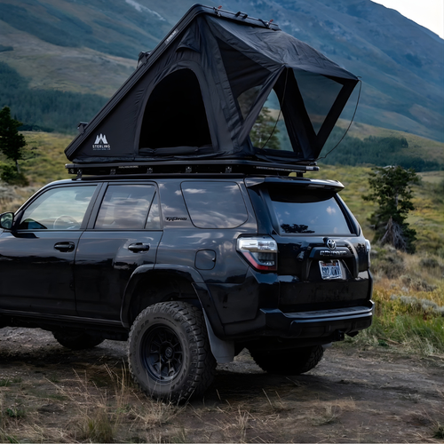 Side profile of aluminum hardshell RTT on 4Runner roof rack