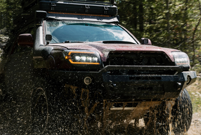 4th gen Toyota 4Runner off road on rugged terrain showing trail capability and build style