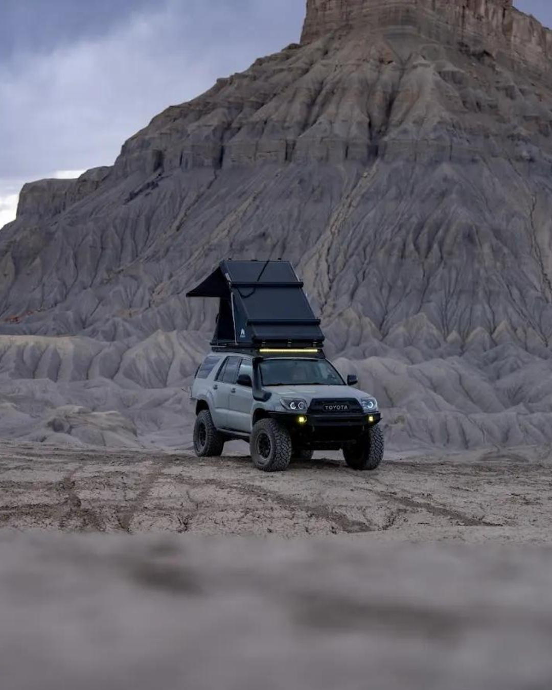 Toyota 4Runner overlanding setup with Sterling Adventure Co rooftop tent in camp