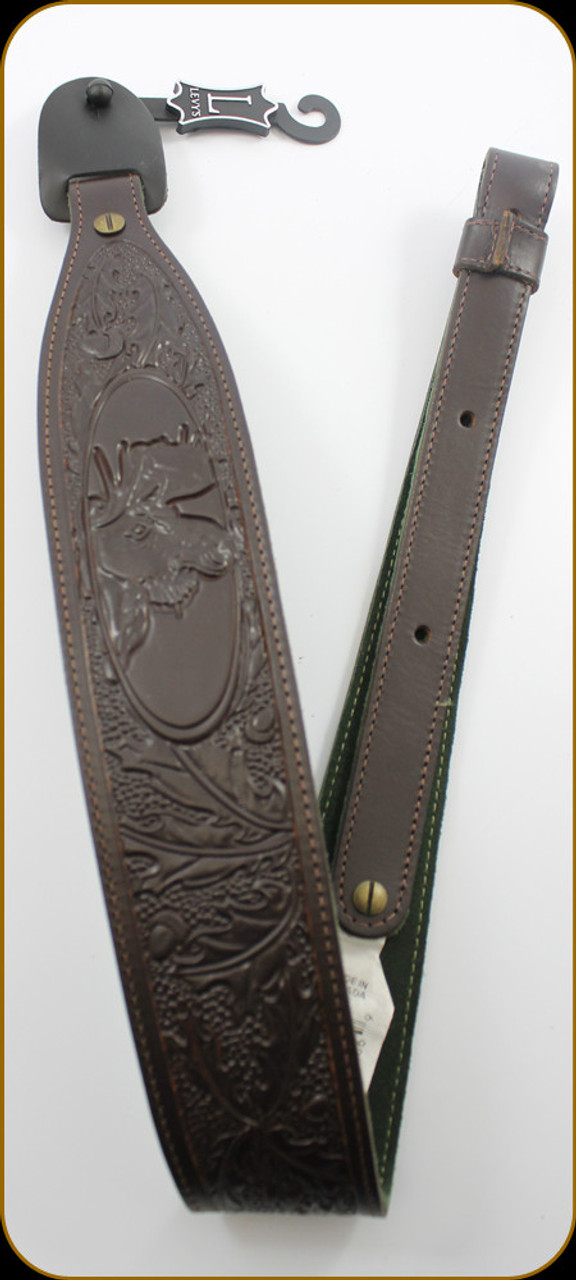Product Description
2 1/4″ veg-tan leather cobra rifle sling with moose design tooling, suede backing, and loop adjustment. Loop ends fit 1″ swivels and are secured with Chicago screws. Adjustable from 29″ to 36″.

Dimensions - 36 × 2.25 in

Color - Dark Brown

Width - 2.25"

Length - 36"

Material - Veg Tan Leather