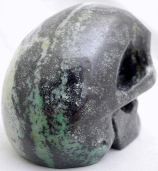 Raven's Green Grossular Garnet Crystal Skull Carving