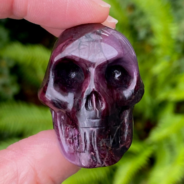 Raven's Ultra Fine Royal Sugilite Carved Crystal Skull