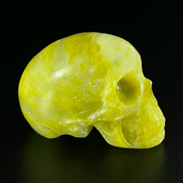 Raven's Green Calcite Carved Crystal Skull