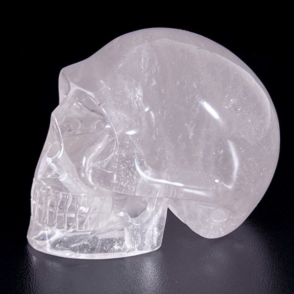 Raven's Radiating Carved Clear Quartz Crystal Skull
