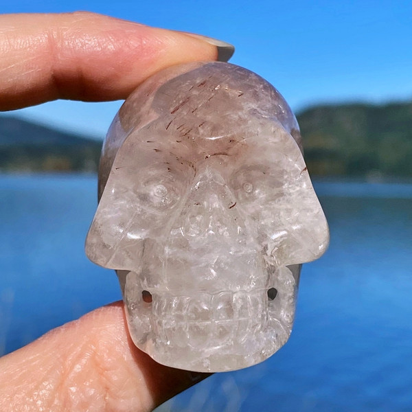 Raven's Carved Red Rutilated Quartz Crystal Skull