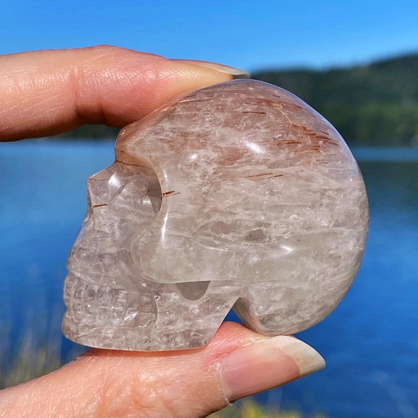 Raven's Carved Red Rutilated Quartz Crystal Skull