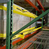 Pallet racking safety straps protect from accidental push-throughs or falls