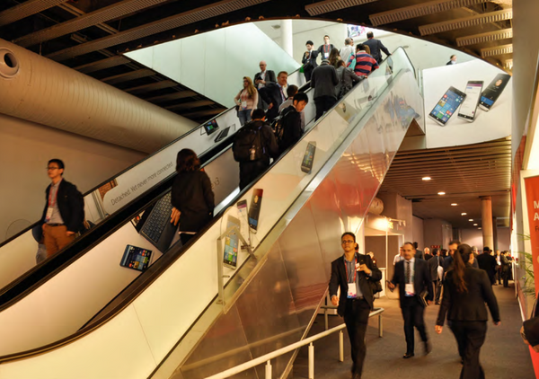 Escalator to Hall 4 branding