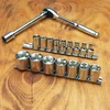 Proferred 3/8" Drive Metric 6-Point Standard Socket Set – 17 Piece with polished chrome sockets arranged on a wooden workbench