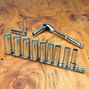 Proferred 3/8" Drive Metric 12-Point Deep Socket Set – 12 Piece with polished chrome sockets arranged on a wooden workbench