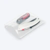 Clear open-end poly bag displaying assorted hand tools.