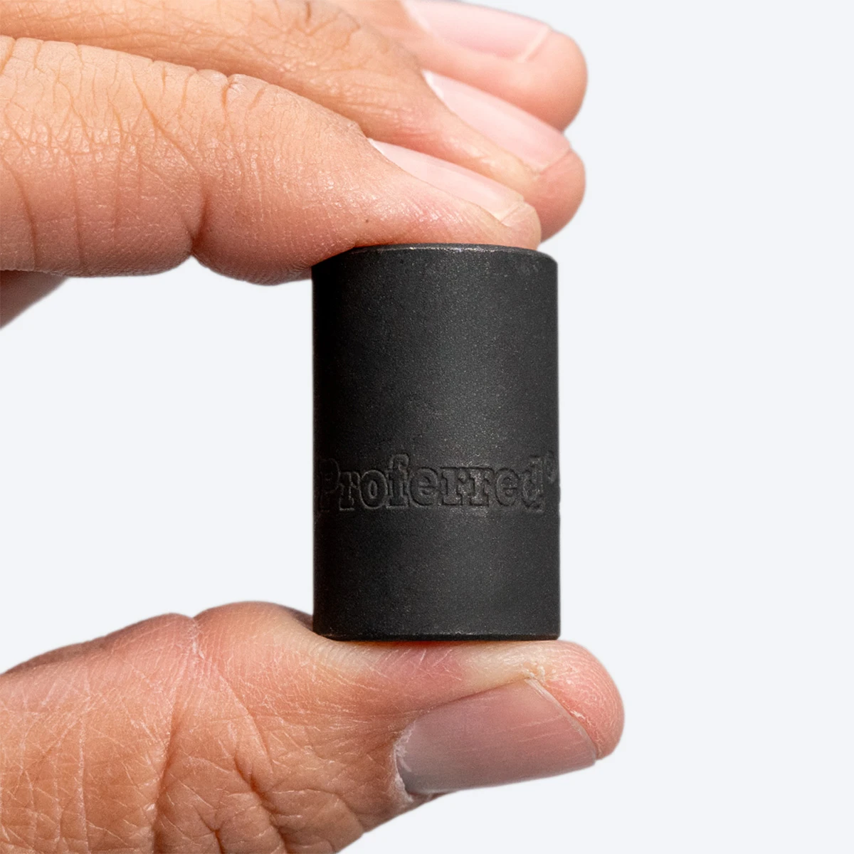 Proferred 3/8" Drive SAE 6-Point Standard Impact Socket held in hand showing socket length and black finish