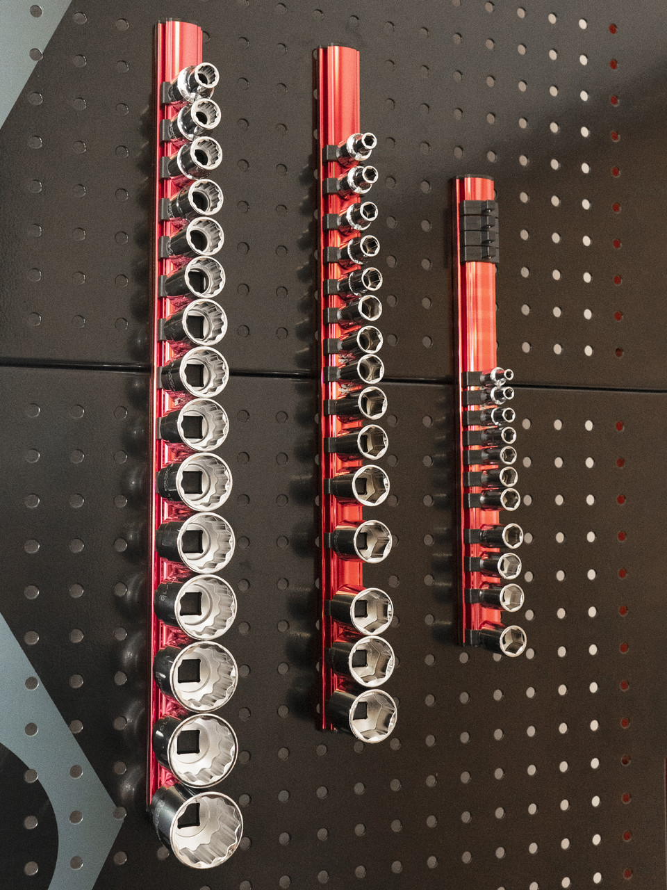 Proferred Magnetic Aluminum Socket Rails in three sizes mounted on pegboard with sockets