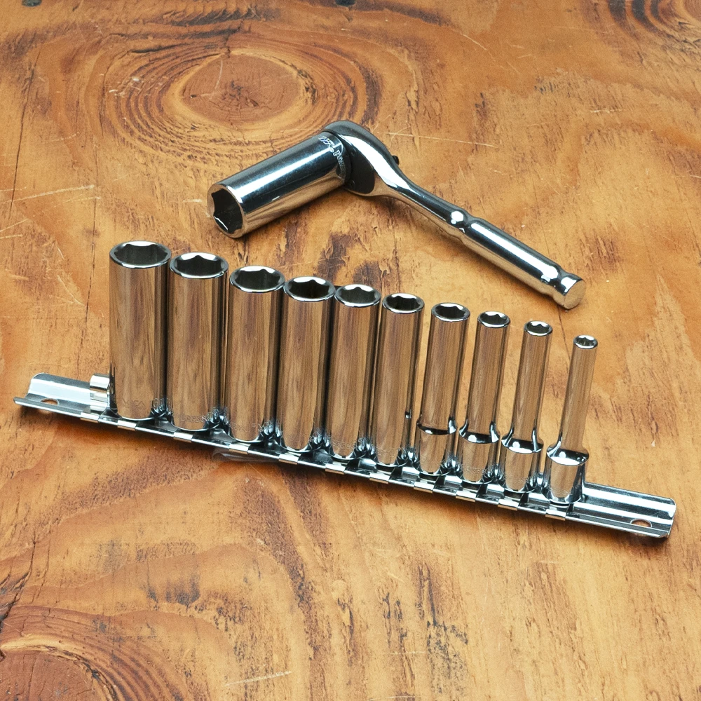 Proferred 1/4" Drive Metric 6-Point Deep Socket Set – 11 Piece with polished chrome sockets arranged on a wooden workbench