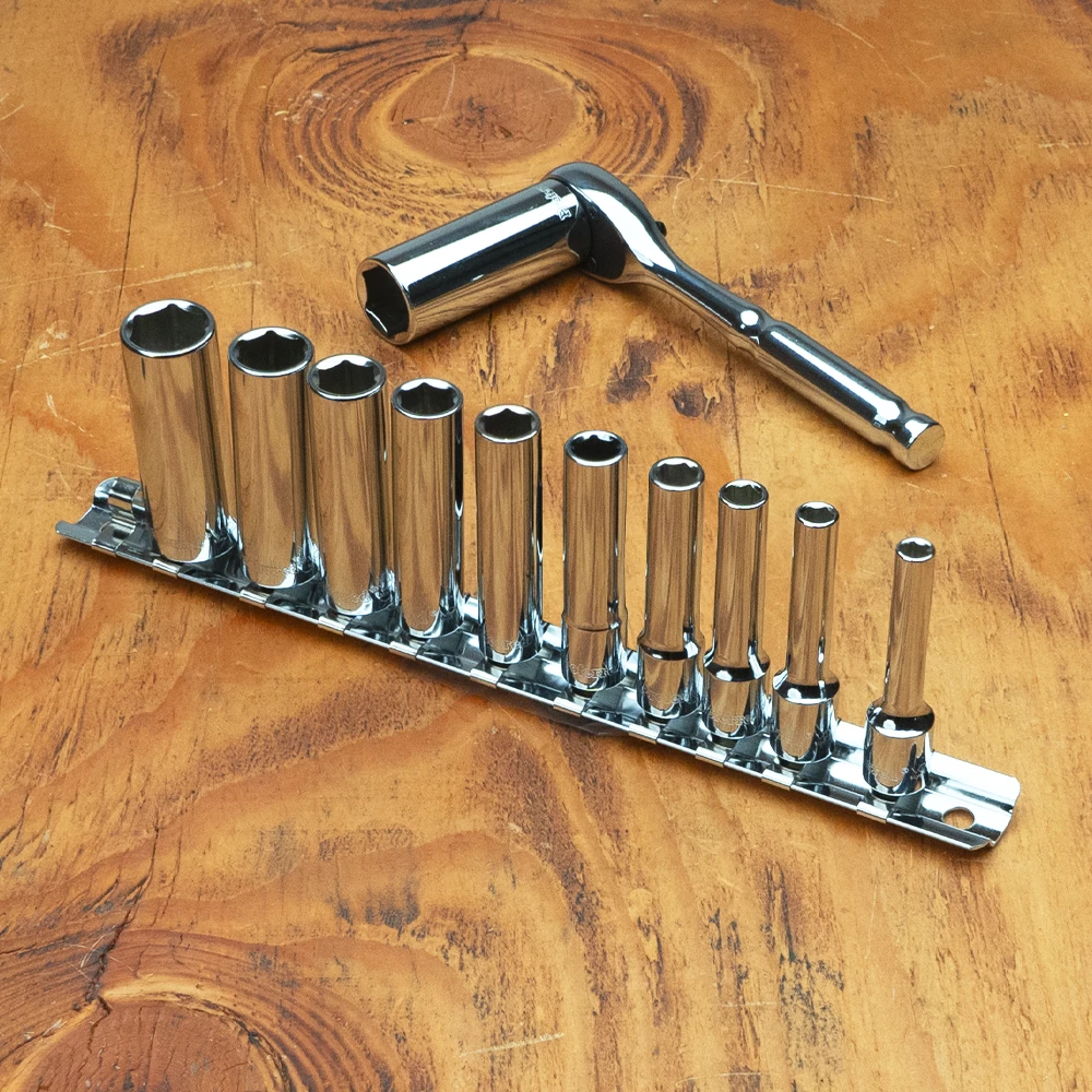 Proferred 1/4" Drive SAE 6-Point Deep Socket Set – 11 Piece with polished chrome sockets arranged on a wooden workbench
