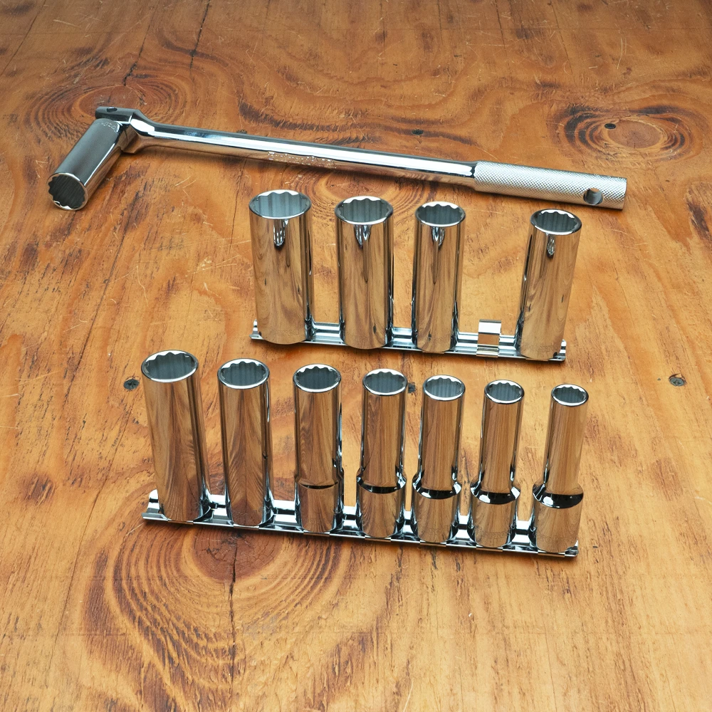 Proferred 1/2" Drive Metric 12-Point Deep Socket Set – 12 Piece with polished chrome sockets arranged on a wooden workbench