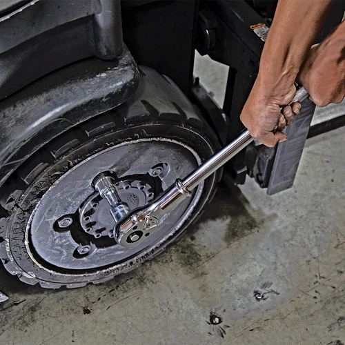 Proferred 3/4" Drive SAE 12-Point Standard Socket with ratchet wrench in heavy-duty vehicle maintenance