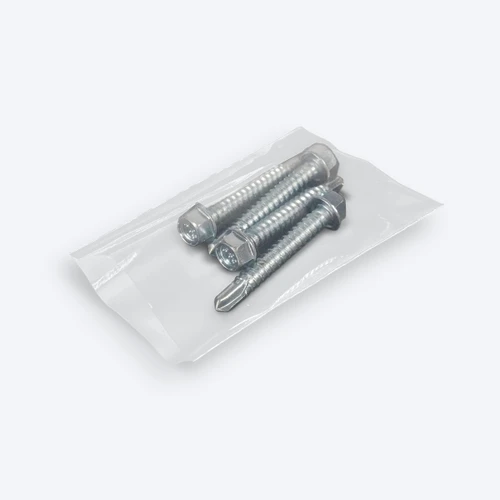 	Clear open-end poly bag containing metal bolts and fasteners.