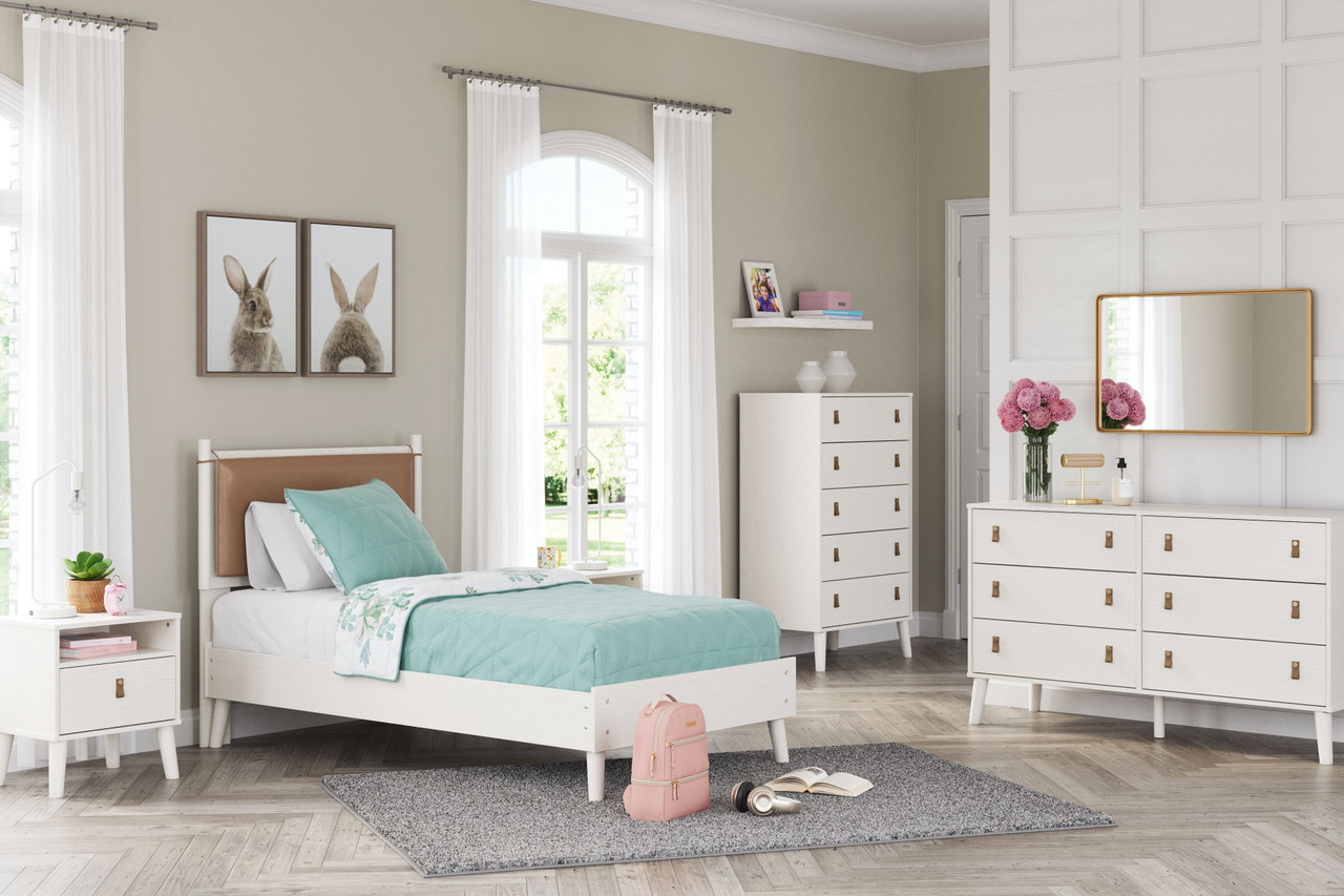 The Aprilyn White 4 Pc. Dresser, Chest, Twin Panel Bed available at Wier  Furniture serving Lewistown, MT and surrounding areas.