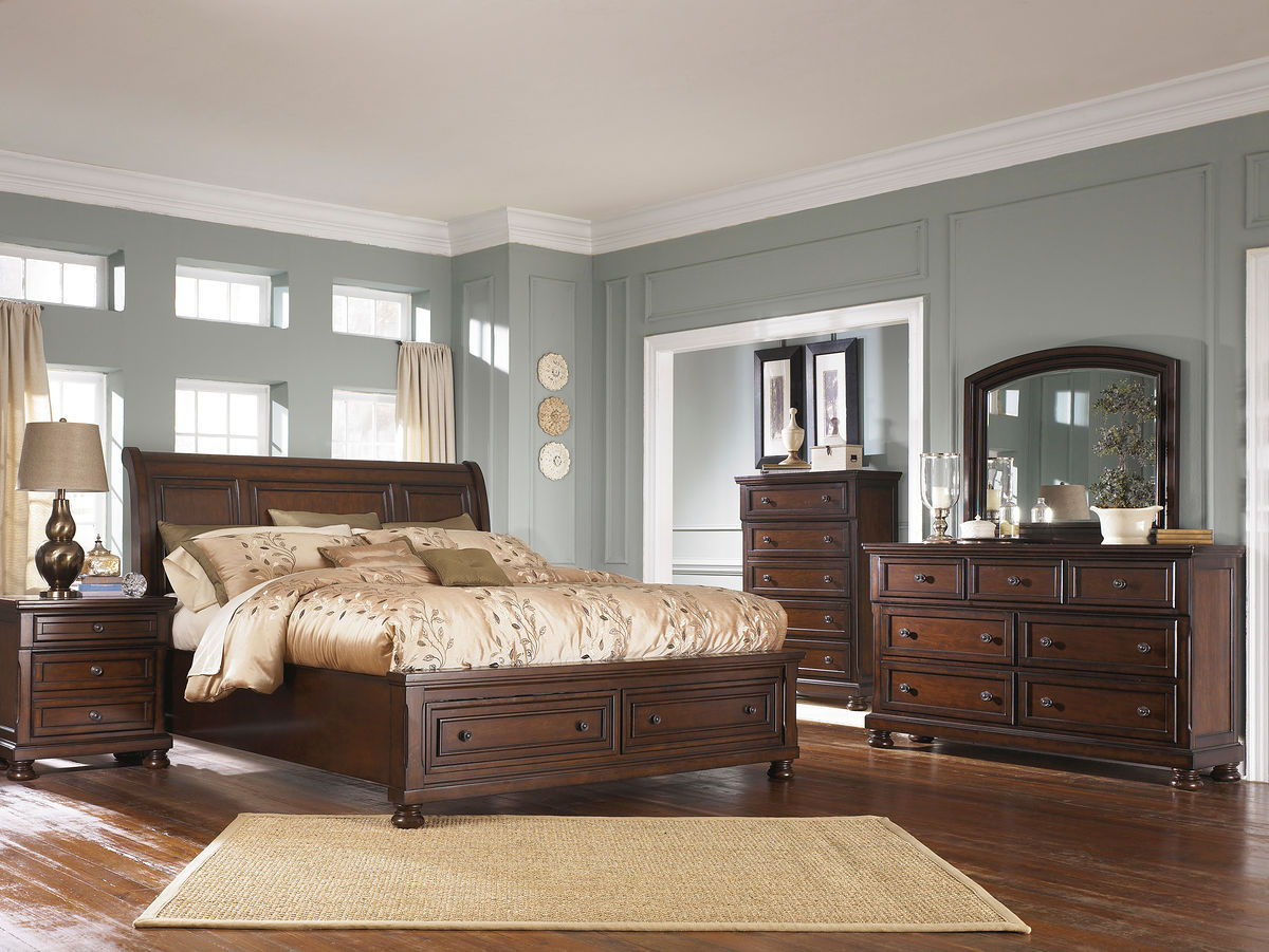 The Porter Rustic Brown 6 Pc. Dresser, Mirror, Chest, Queen Sleigh Bed With  2 Storage Drawers available at Wier Furniture serving Lewistown, MT and  surrounding areas.
