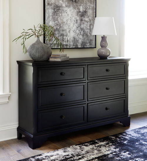 The Chylanta Black 4 Pc. Dresser, Mirror, Queen Sleigh Bed available at  Wier Furniture serving Lewistown, MT and surrounding areas.