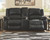 Calderwell Black Double Reclining Loveseat W/Console