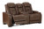 The Man-den Mahogany Power Reclining Loveseat/Con/Adj Hdrst The Man-den Mahogany Power Reclining Loveseat/Con/Adj Hdrst