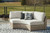 Calworth Beige Curved Loveseat With Cushion
